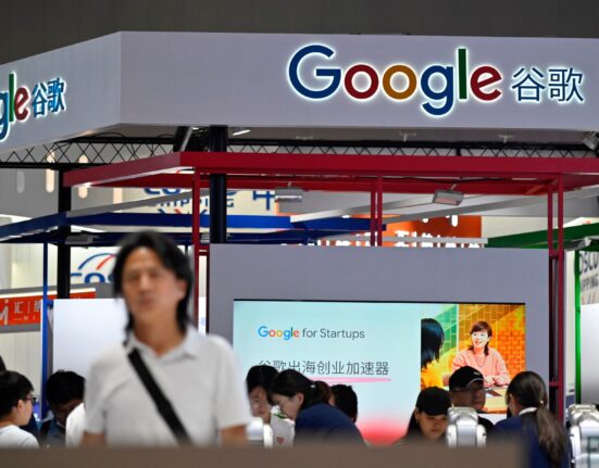 People visit the booth of Google during the World Artificial Intelligence Conference (WAIC) in Shanghai on July 6, 2023. (Photo by Wang Zhao / AFP)