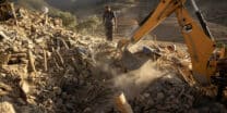 Rescue workers dig through rubble after an earthquake in the mountain village of Tafeghaghte, southwest of the city of Marrakesh, on September 9, 2023. Morocco's deadliest earthquake in decades has killed more than 1,300 people, authorities said on September 9, as troops and emergency services scrambled to reach remote mountain villages where casualties are still feared trapped. (Photo by Fadel Senna / AFP)