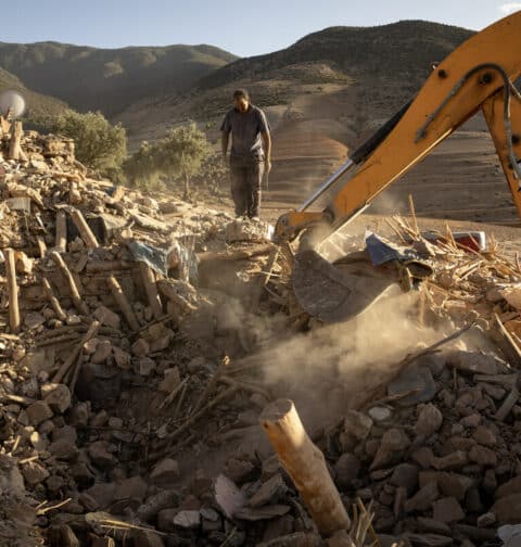 Rescue workers dig through rubble after an earthquake in the mountain village of Tafeghaghte, southwest of the city of Marrakesh, on September 9, 2023. Morocco's deadliest earthquake in decades has killed more than 1,300 people, authorities said on September 9, as troops and emergency services scrambled to reach remote mountain villages where casualties are still feared trapped. (Photo by Fadel Senna / AFP)