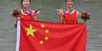 Gold medallists China's Zou Jiaqi and Qiu Xiuping pose for a photo during a medal ceremony after the women's light-weight double sculls final event of rowing during the 2022 Asian Games in Hangzhou in China's eastern Zhejiang province on September 24, 2023. (Photo by JUNG YEON-JE / AFP)