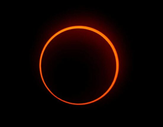 The "Ring of Fire" effect caused during the annular solar eclipse is seen from Penonome, Panama, on October 14, 2023. (Photo by Luis Acosta / AFP)