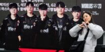 A woman poses next to a cardboard cutout of South Korea's T1 team at the '2023 Worlds Fan Fest' for the League of Legends World Championship 2023, also known as LoL Worlds 2023 or Worlds 2023, at Gwanghwamun Square in Seoul on November 17, 2023, ahead of the grand final on November 19. - The LoL season will culminate in a best of five match between South Korea's T1 and Chinese team Weibo Gaming at the sold 18,000-seat Gocheok Sky Dome in western Seoul on November 19. (Photo by Anthony WALLACE / AFP)