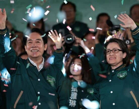 Taiwan's President-elect Lai Ching-te (L) and his running mate Hsiao Bi-khim attend a rally outside the headquarters of the Democratic Progressive Party (DPP) in Taipei on January 13, 2024, after winning the presidential election. - Taiwan's ruling party candidate Lai Ching-te, branded a threat to peace by China, on January 13 won the island's presidential election, a vote watched closely from Beijing to Washington. (Photo by Yasuyoshi CHIBA / AFP)