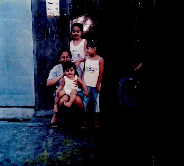 Raised by women | A grandmother with her grandchildren